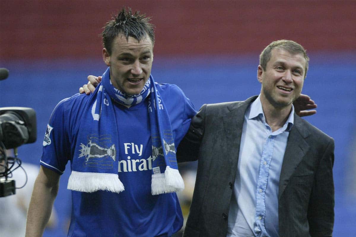 John Terry (L) and Roman Abramovich celebrate winning the league