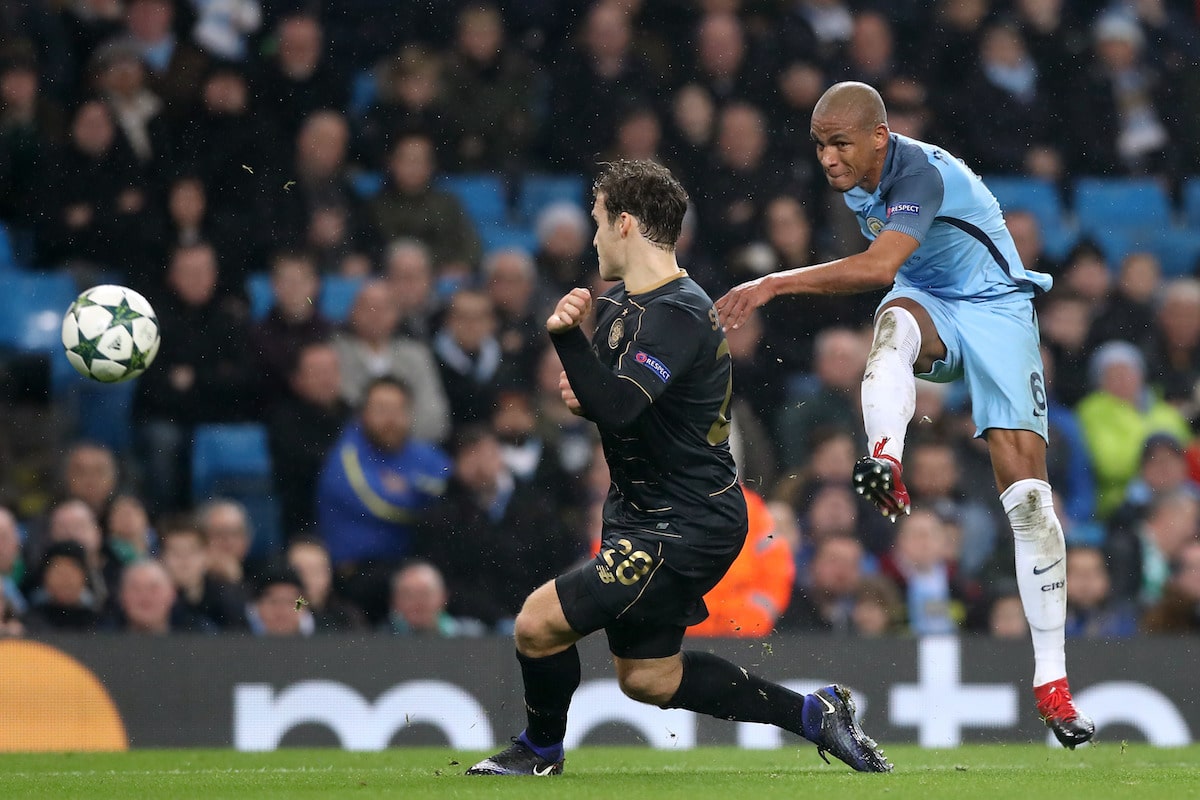 Manchester City's Fernando (right) hits a shot towards goal under pressure from Celtic's Erik Sviatchenko