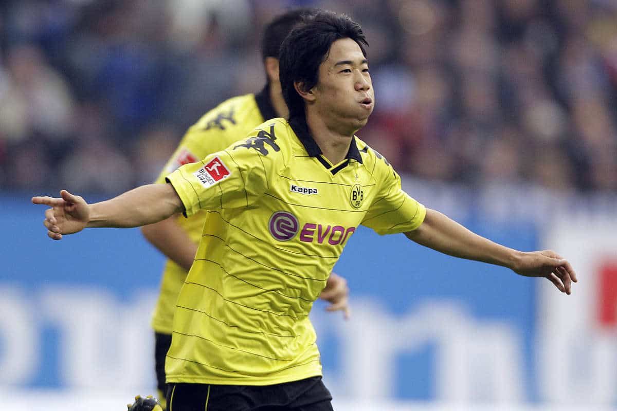 Shinji Kagawa celebrates scoring a goal for Borussia Dortmund