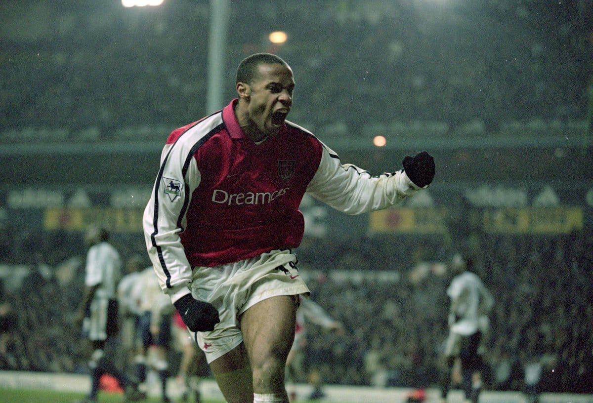 Arsenal striker Thierry Henry celebrates scoring against Tottenham Hotspur in the Premier League