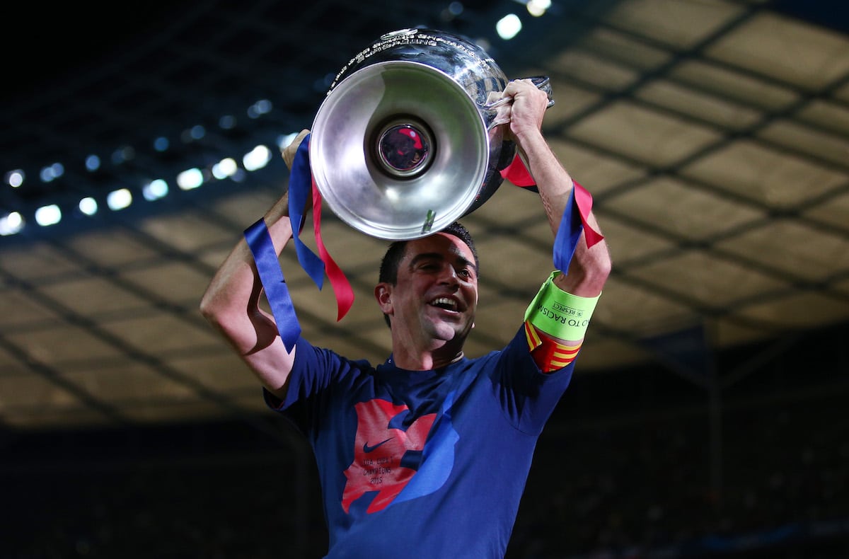 Barcelona midfielder Xavi lifts the Champions League after beating Juventus in the final