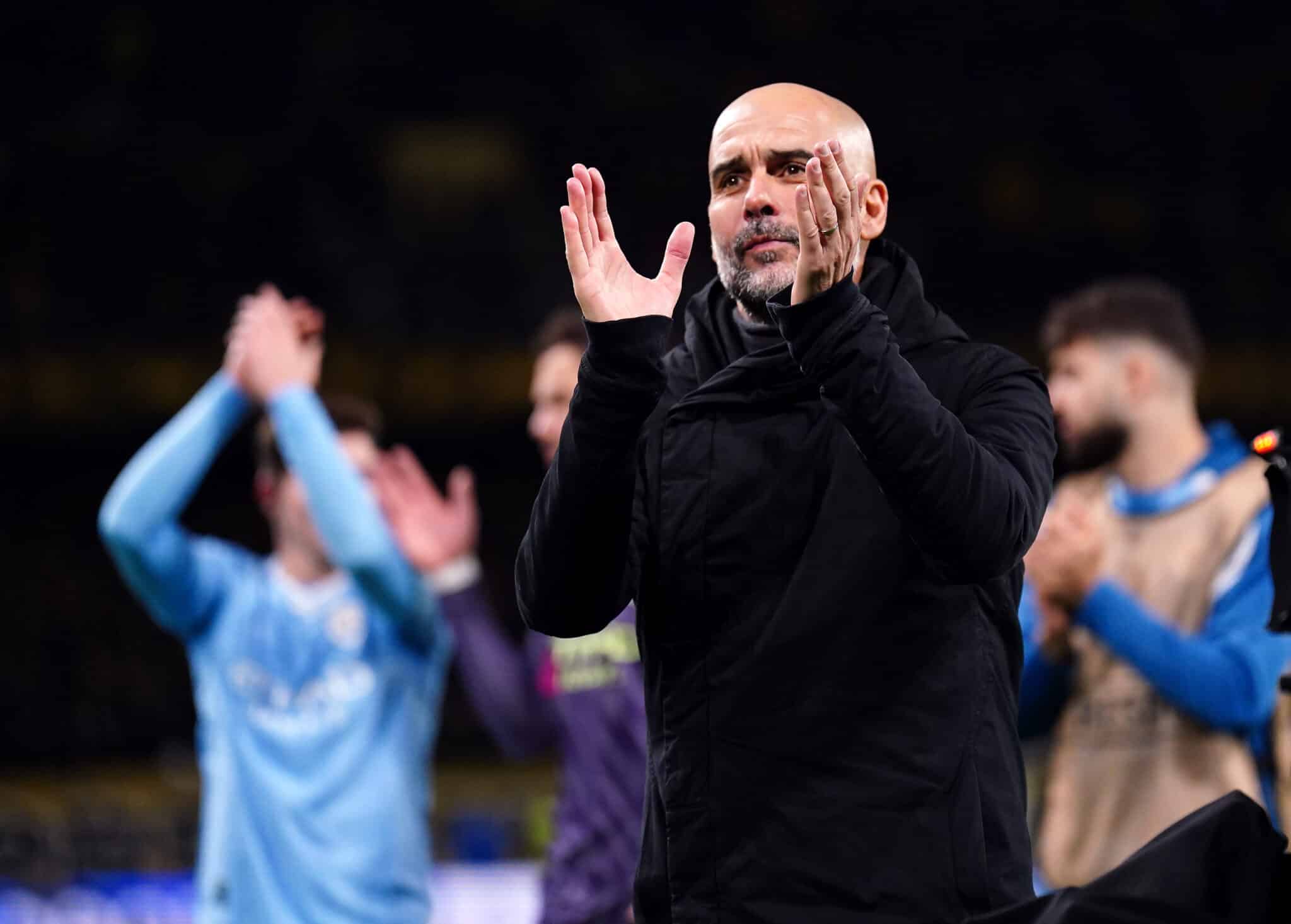 Pep Guardiola applauds