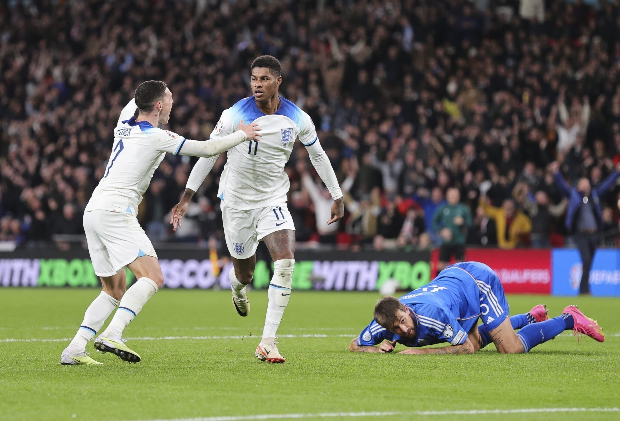 Marcus Rashford of England celebrates