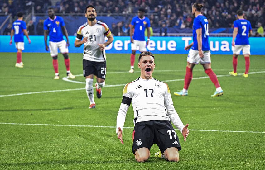 Florian Wirtz celebrates sliding on knees