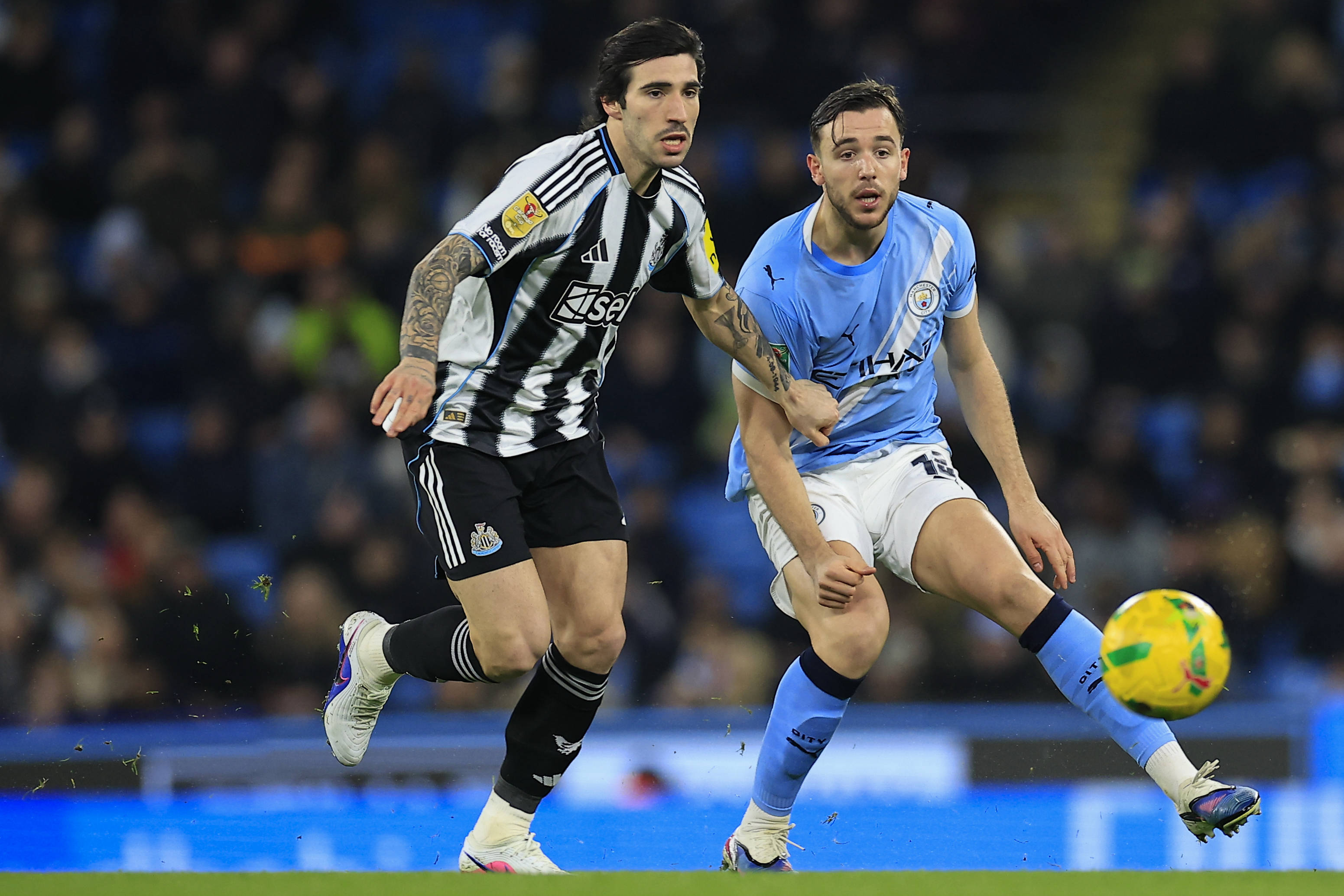 Sandro Tonali in action vs Man City