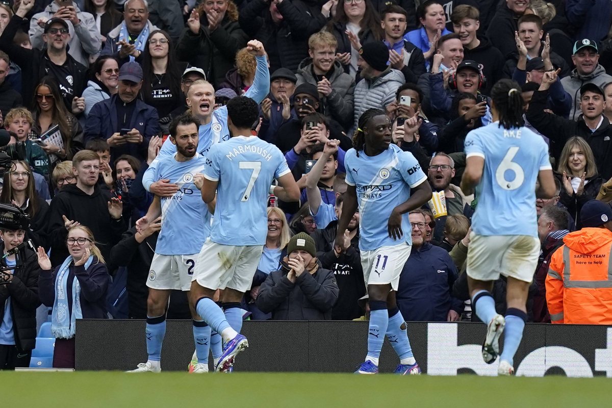 Man City players celebrate a goal